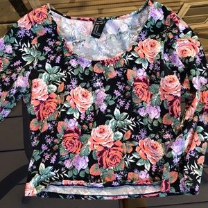 Quarter sleeved, flowery crop top.